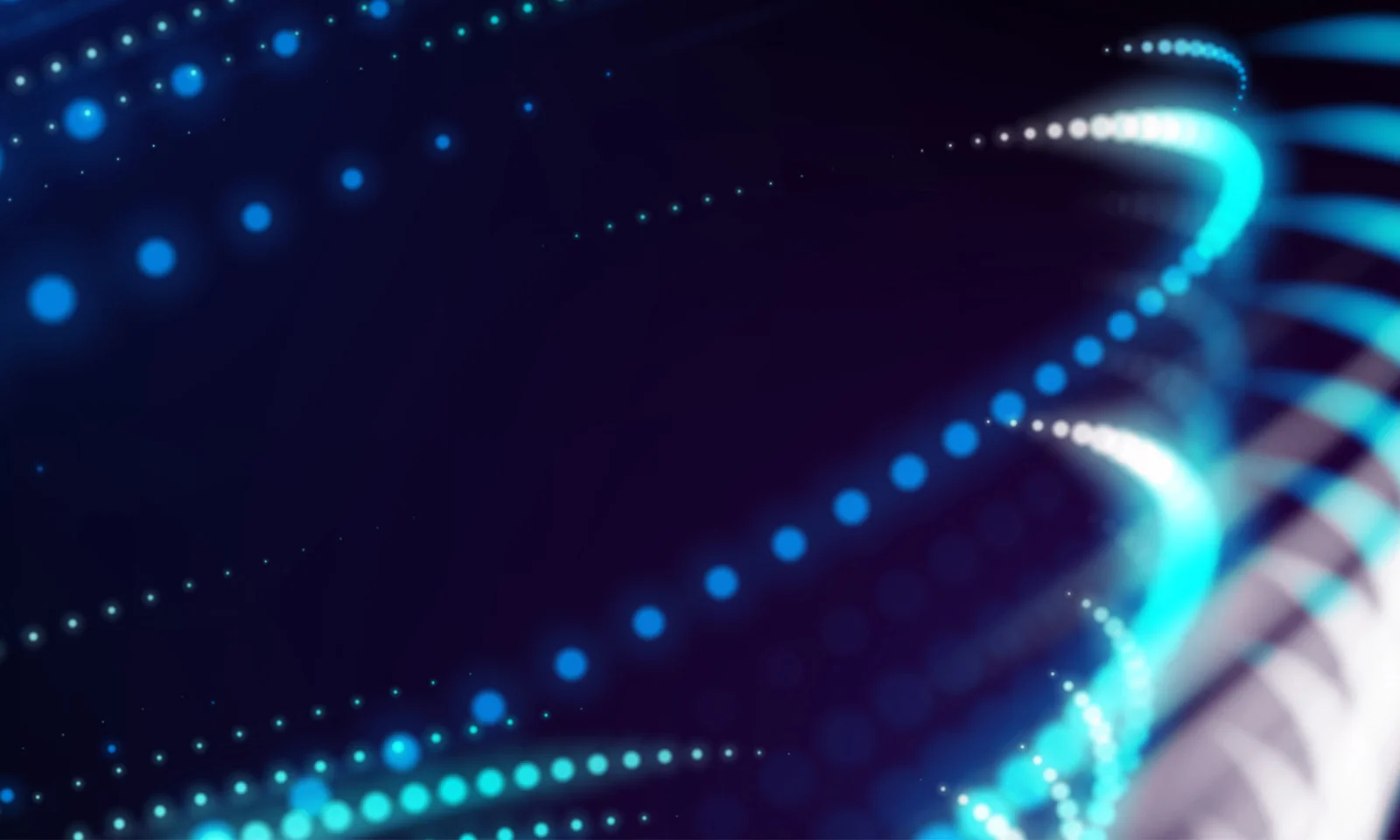 Alper Seguros Embraces Modern Technologies to Position for Growth Abstract digital light patterns in blue tones, representing the integration of modern technologies for business growth.